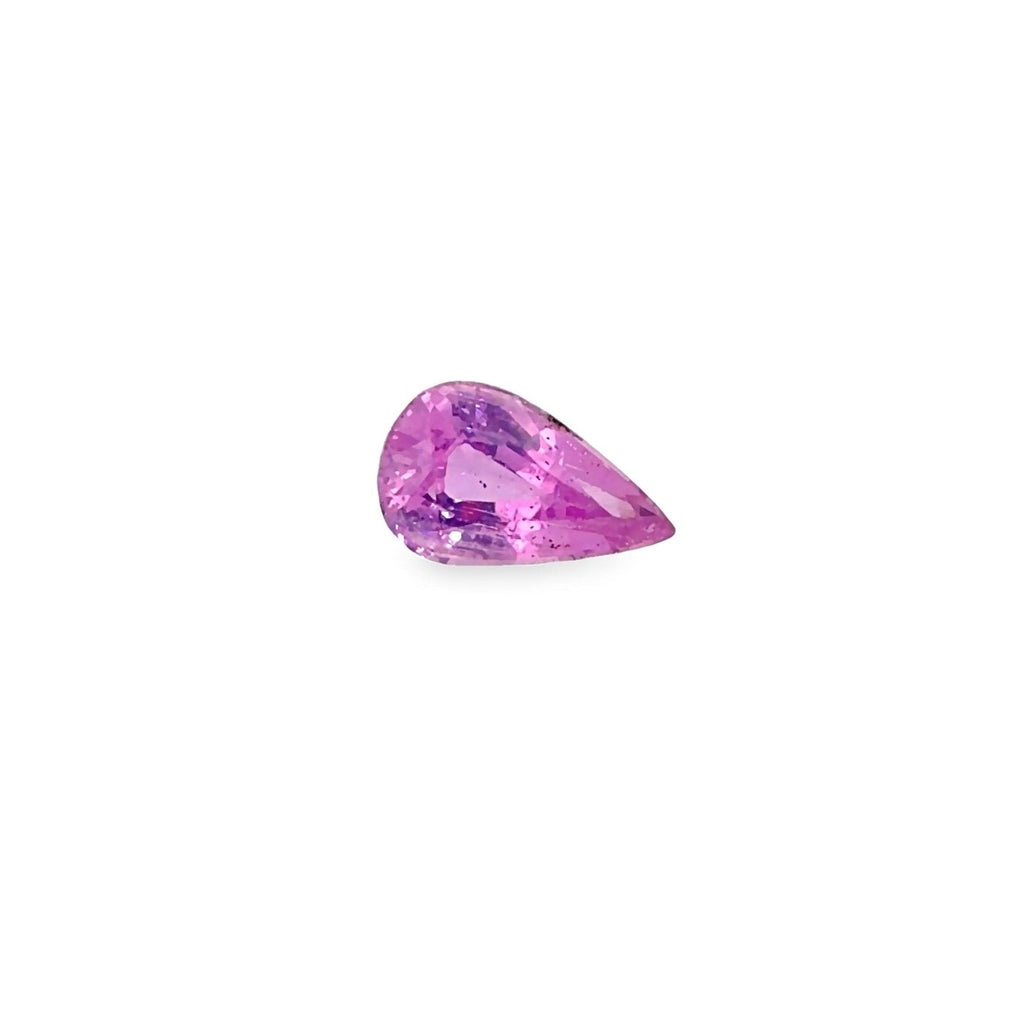 A pear-cut pink gemstone with faceted cuts, centered on a solid white background.