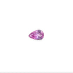 A pear-cut pink gemstone with faceted cuts, centered on a solid white background.